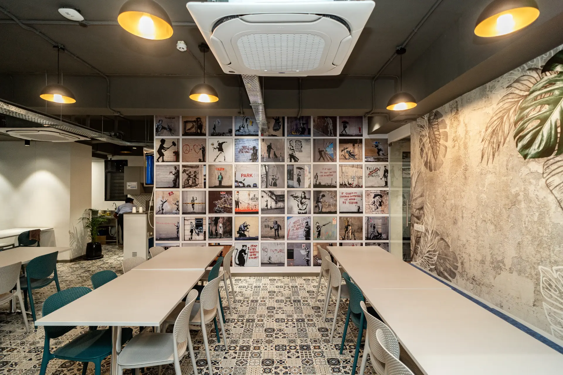 Wide Canteen with Mural and Pantry at YesssWorks Goregaon
