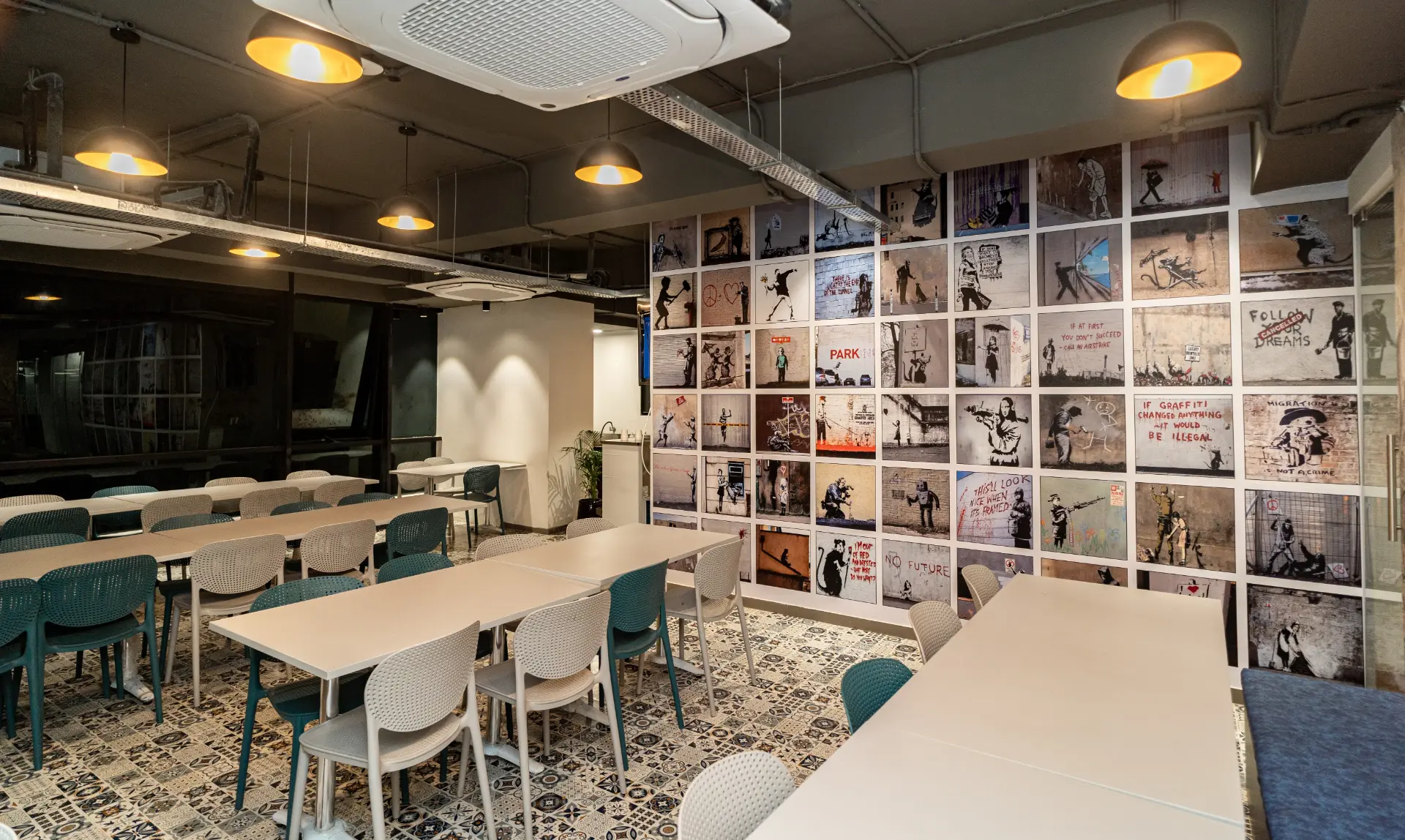 Cafe Seating Along the Art Wall at YesssWorks Goregaon