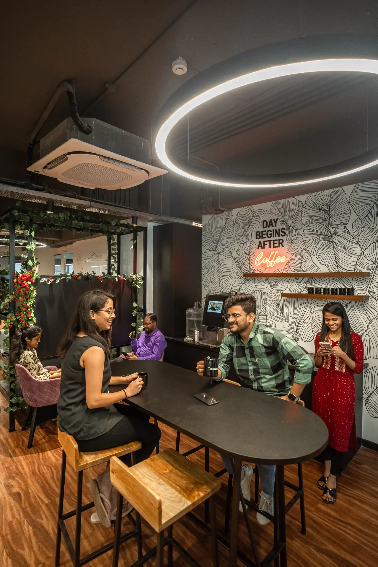 Team Catching Up at the Coffee Counter at YesssWorks Goregaon