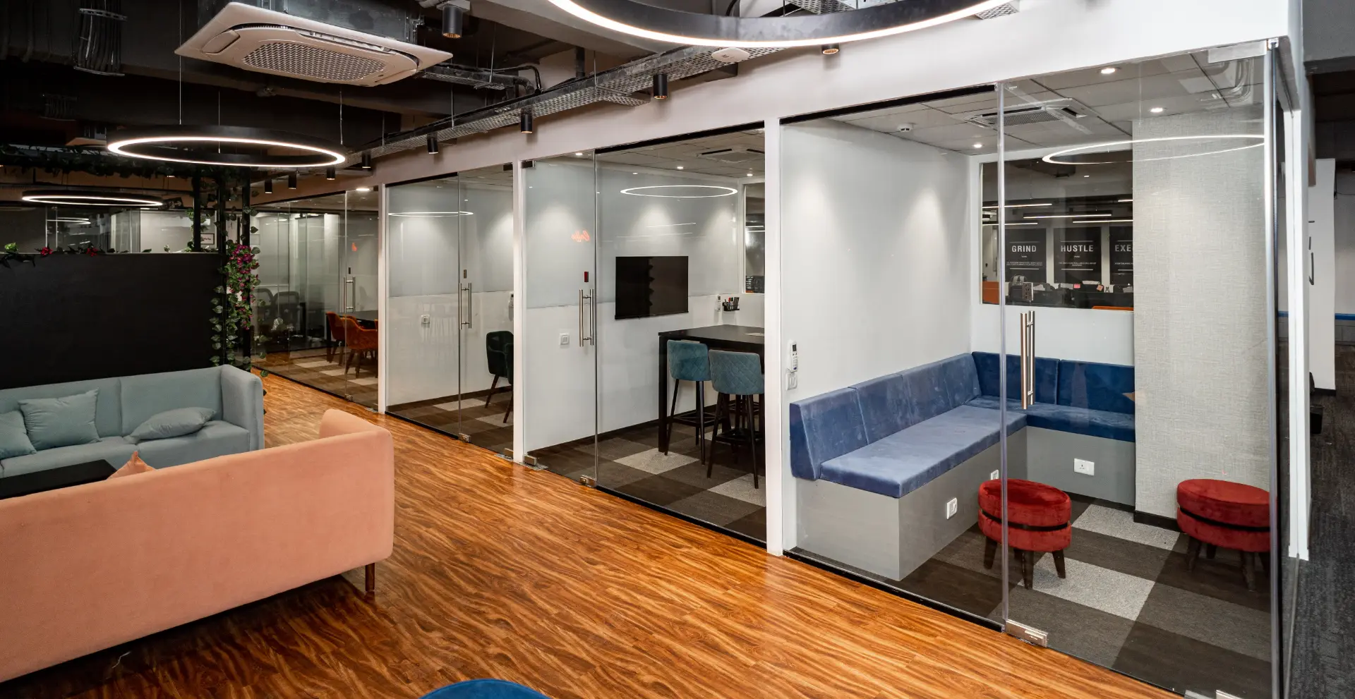 Glass Discussion Booths Beside the Lounge at YesssWorks Goregaon