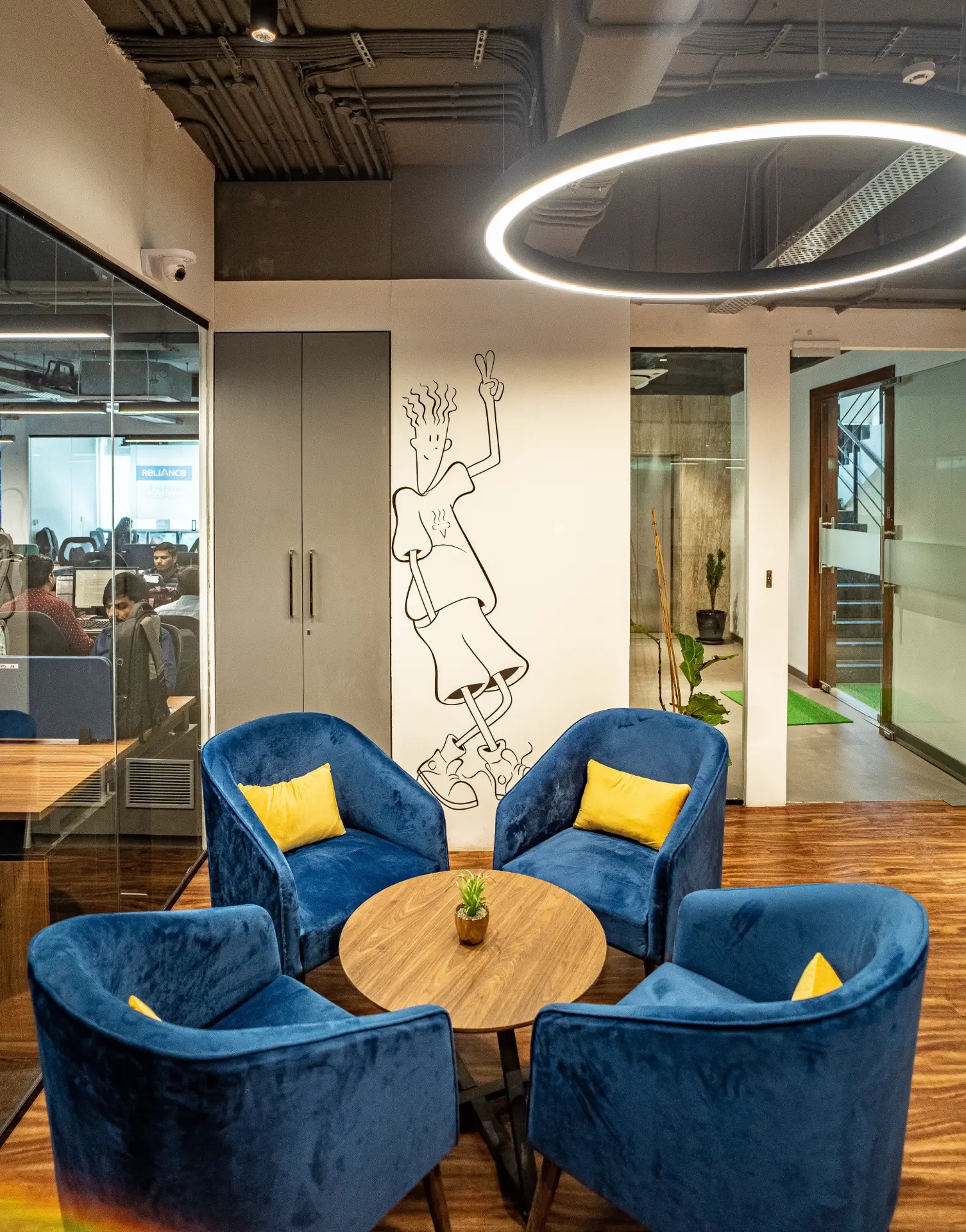 Four Seat Chat Corner with Line Art Mural at YesssWorks Goregaon, 271 Business Park